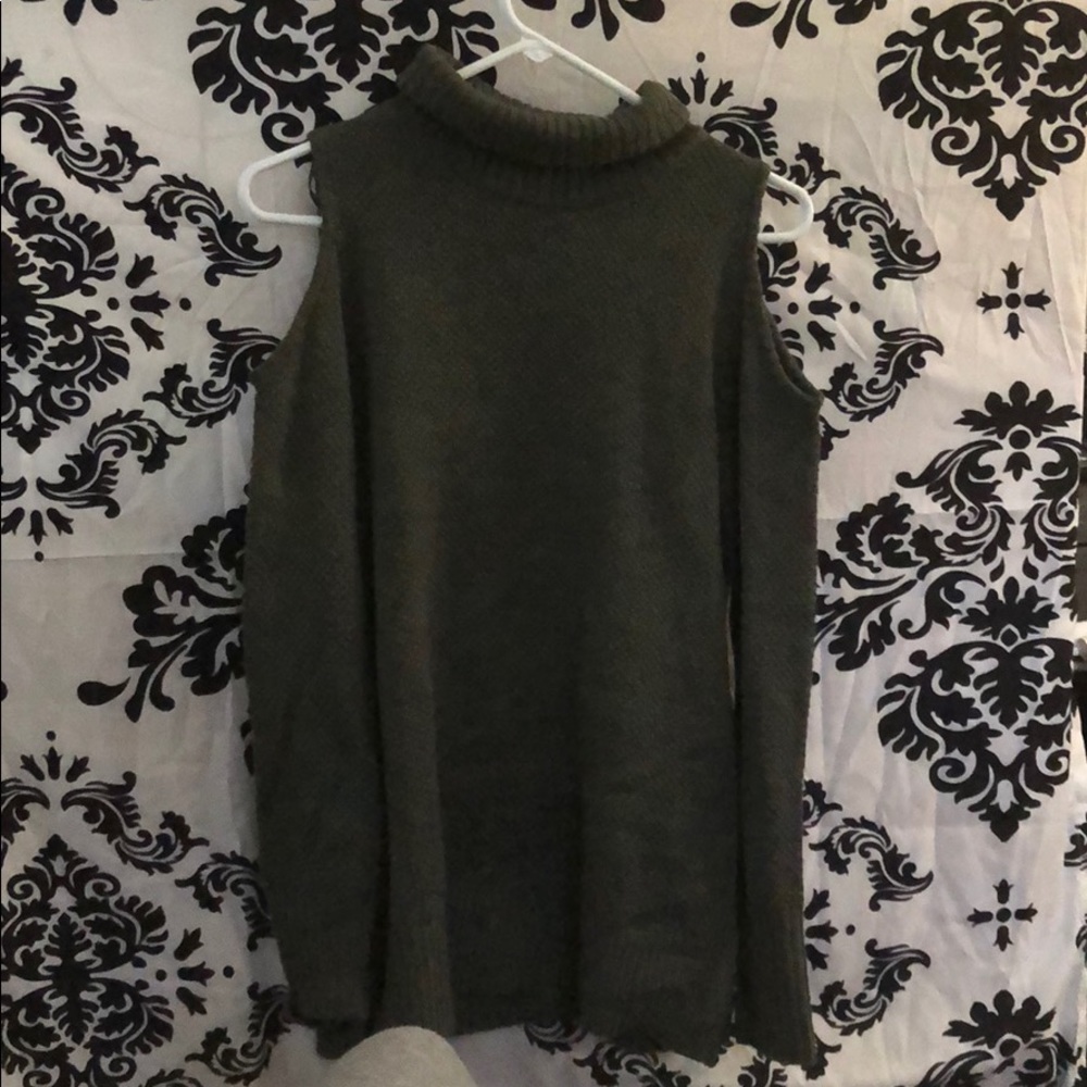 Olive green turtleneck cold shoulder sweater.